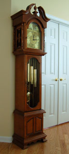 longcase grandfather clock on hardwood floor